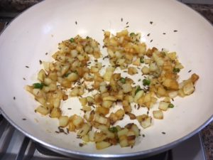 Cook potatoes till crispy