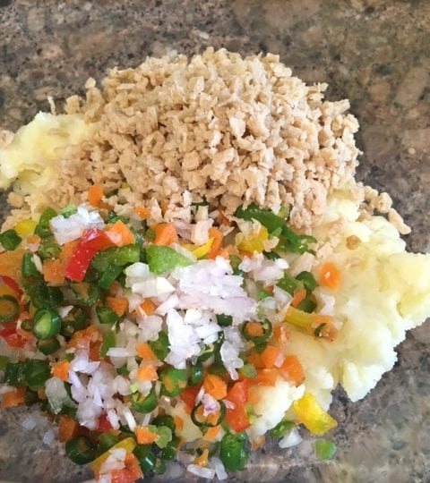 Add chopped veggies, soaked and squeezed soya granules