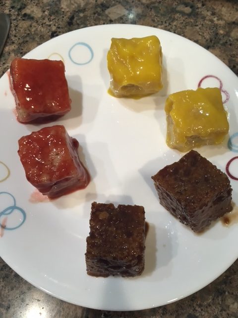 Cake pieces dipped in fruit sauces