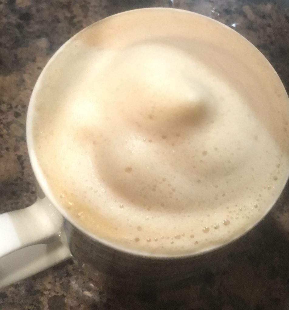 Creamy frothy coffee