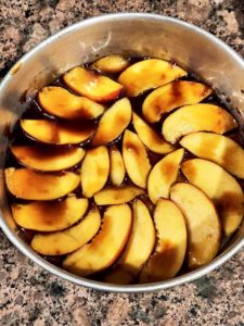 Put caramel sauce over the peaches