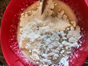 Mix dry ingredients into the wet mix