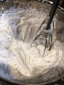 Whip heavy cream till stiff peaks are formed