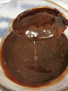 Melt the set ganache either in microwave or double boiler