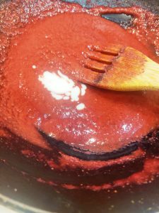 Making strawberry sauce